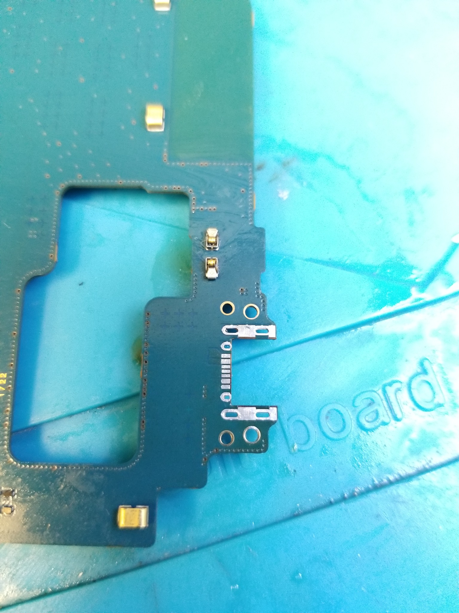 Connector removed; contact pads exposed